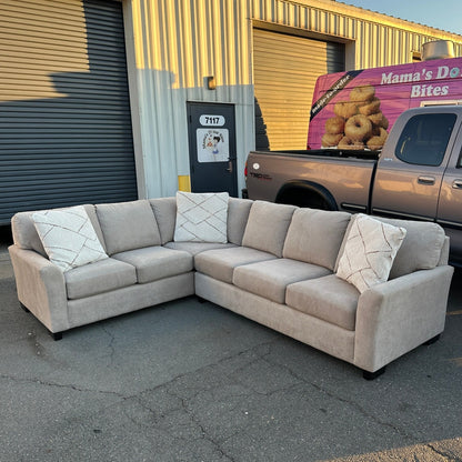 Grey L-Shaped Sectional with Pull-Out Bed