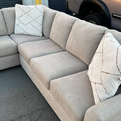 Grey L-Shaped Sectional with Pull-Out Bed